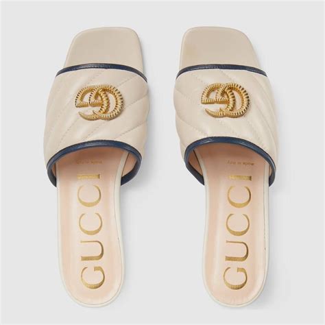 downy holding gucci slides|Gucci ladies slides.